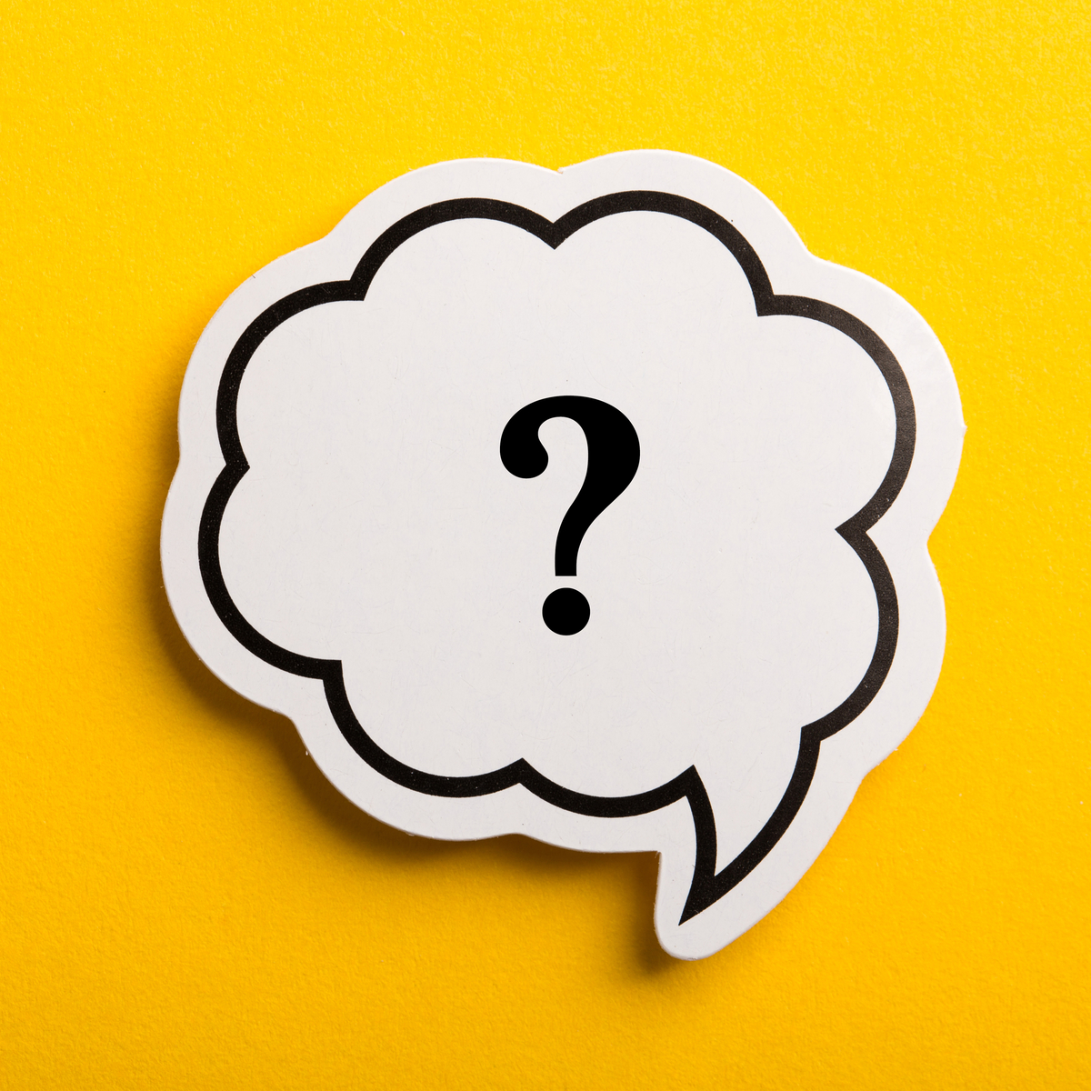 Question mark speech bubble on yellow background.